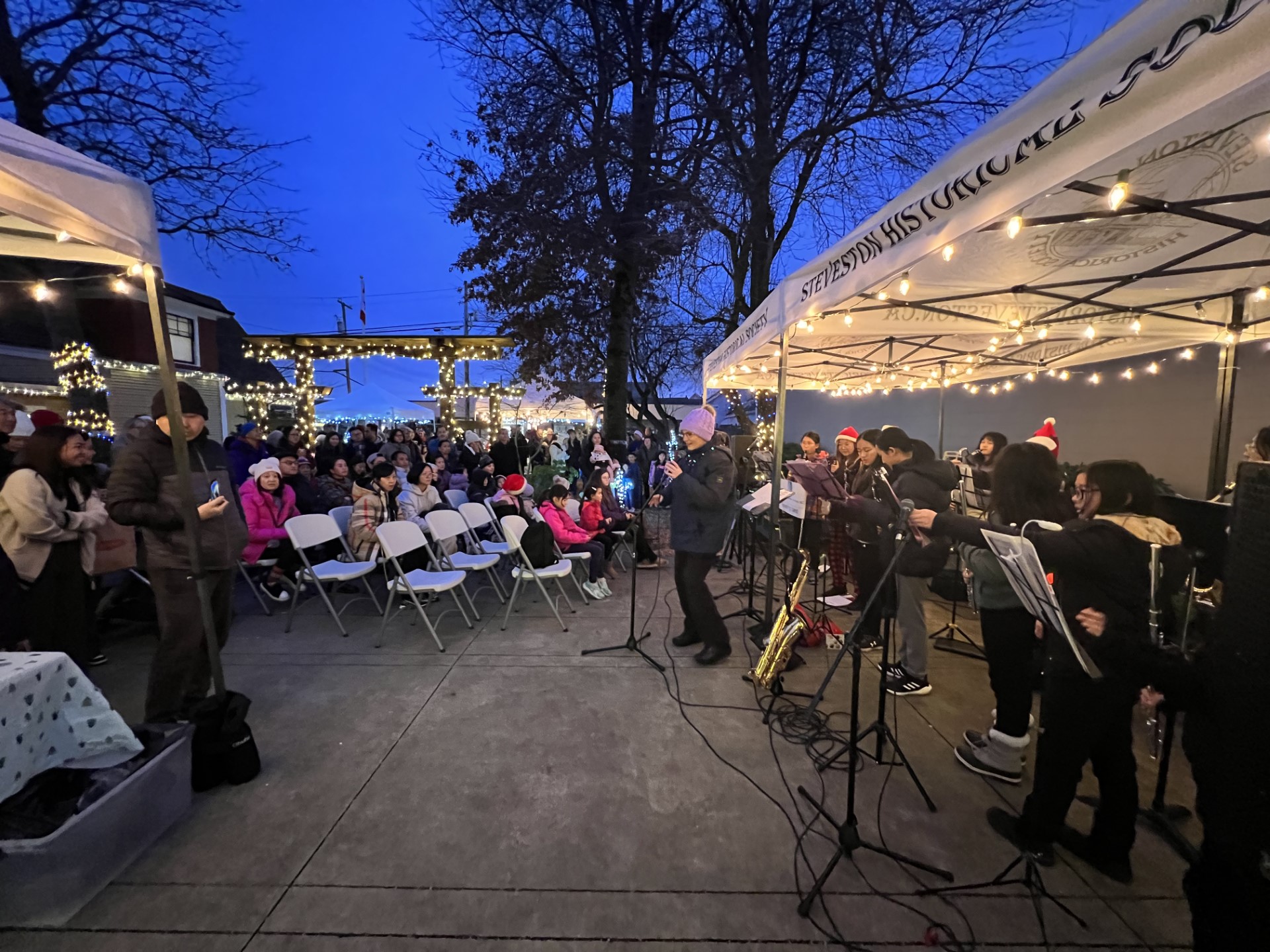 Students performing in front of an audience at Songs in the Snow