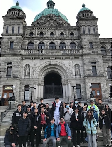 Social Studies 10 studies posing in front of the BC Legislature in Victoria